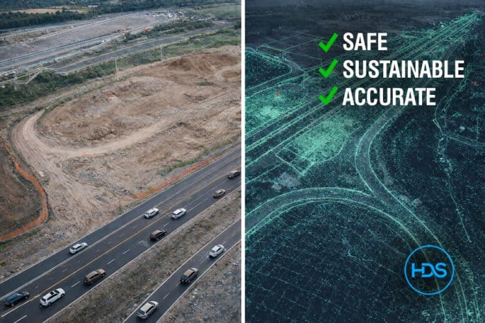 A professional survey drone equipped with RTK GPS hovering over a large-scale UK highway junction construction site during a topographical survey.