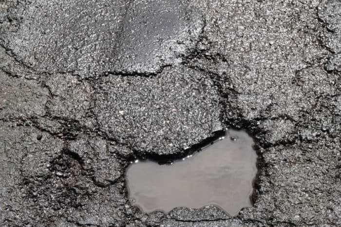 A pothole is only a pothole once somebody decides it meets the threshold